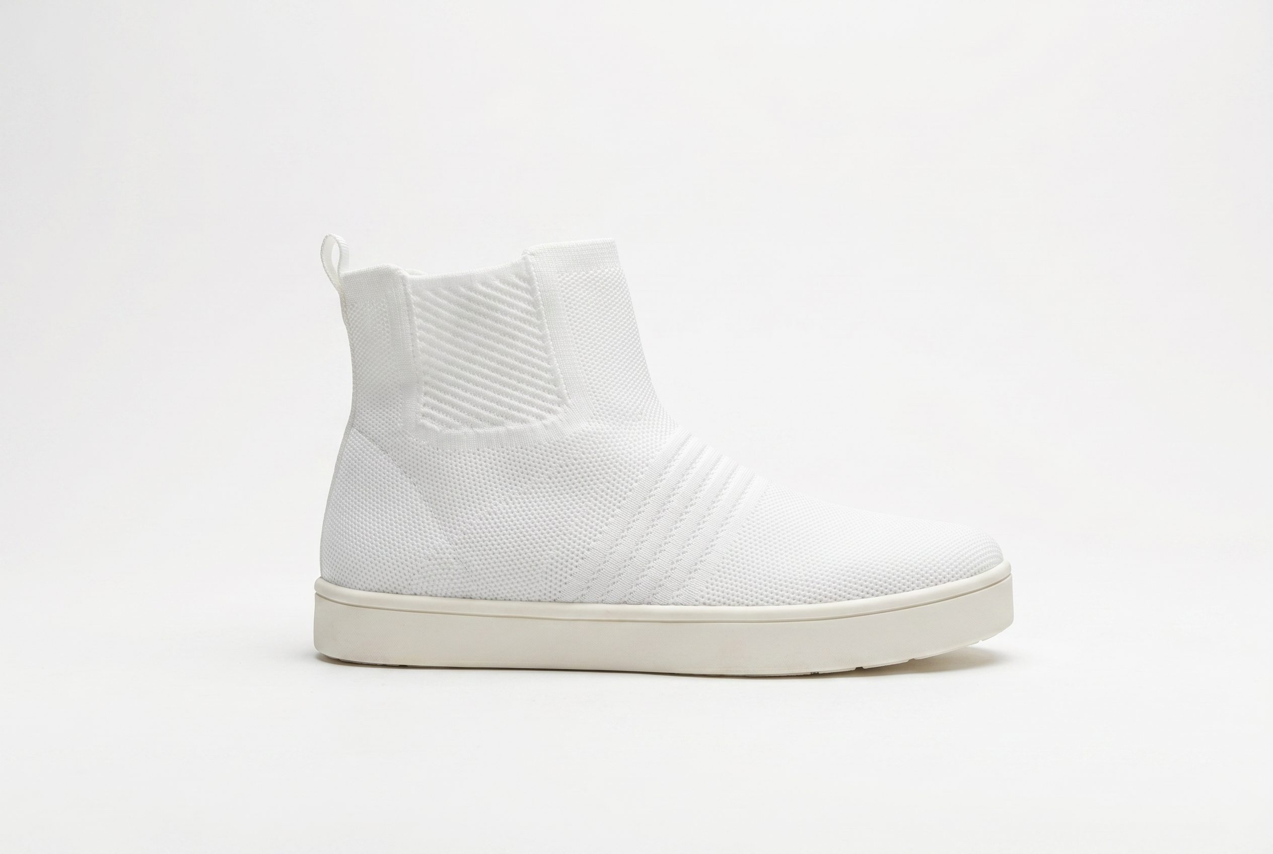 White knit boot studio product image for footwear catalog visuals