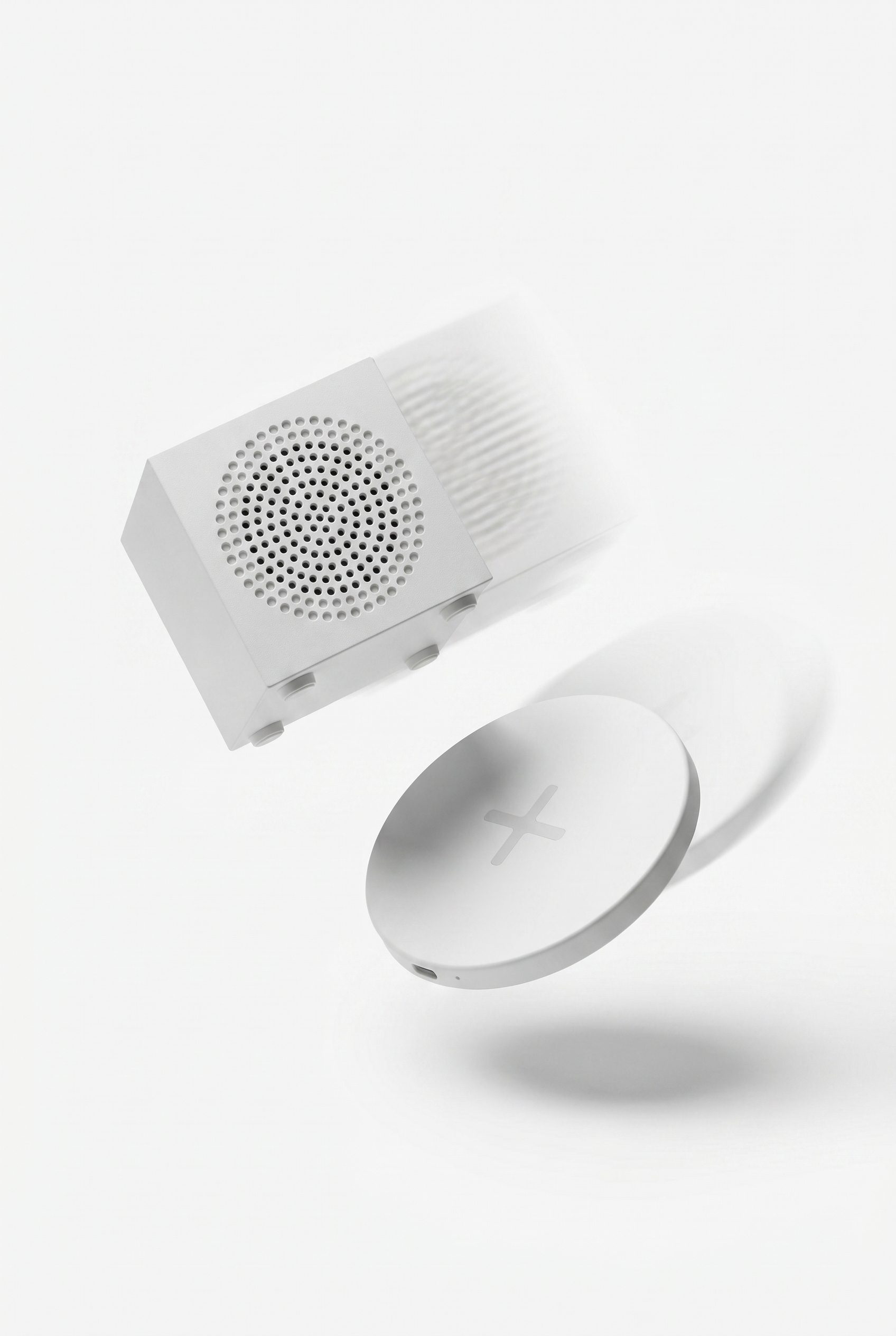 AI background generator for product photos showing a white electronics product with motion blur