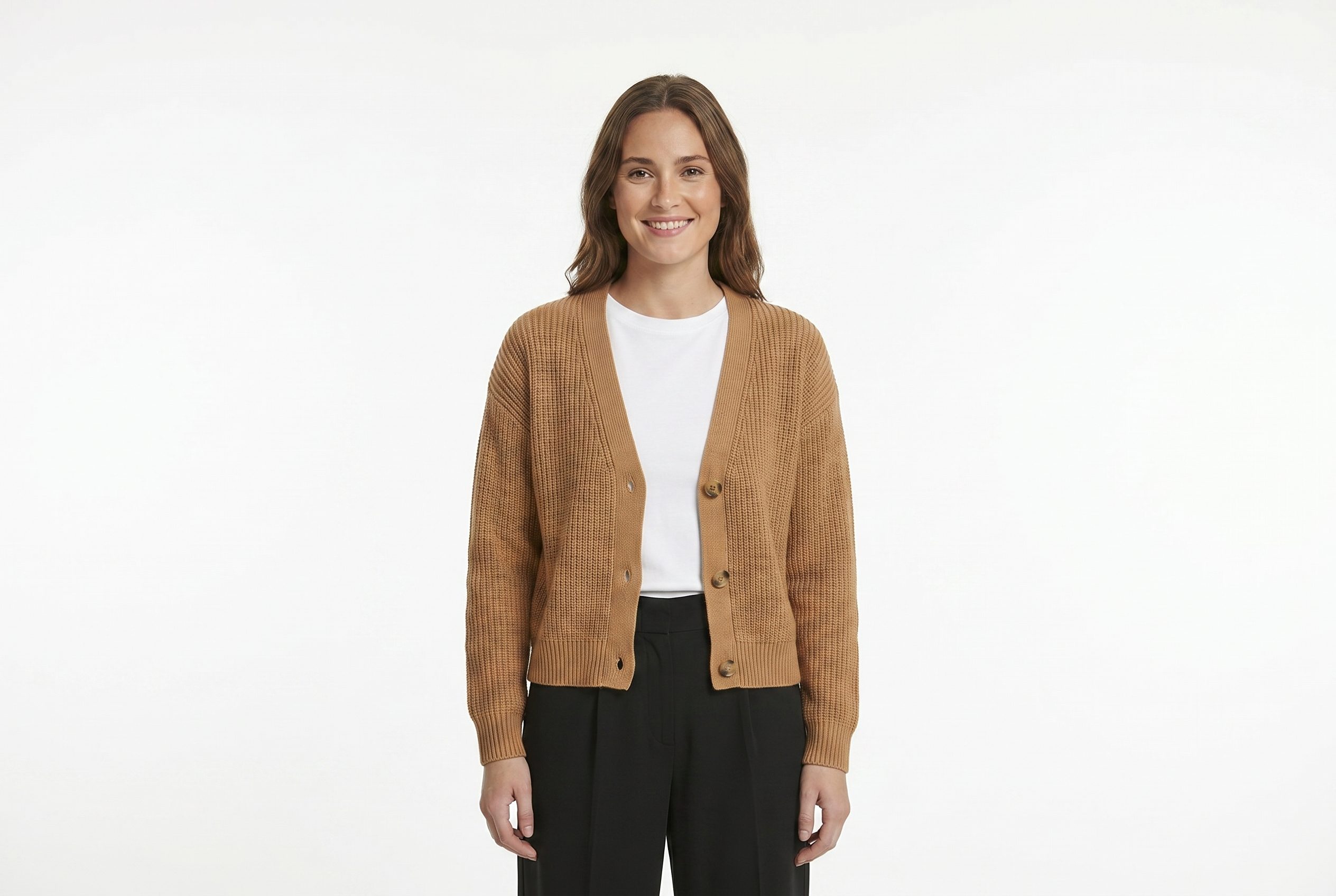 Fotogenic AI model generator output showing a model wearing a camel ribbed cardigan in a clean horizontal studio crop