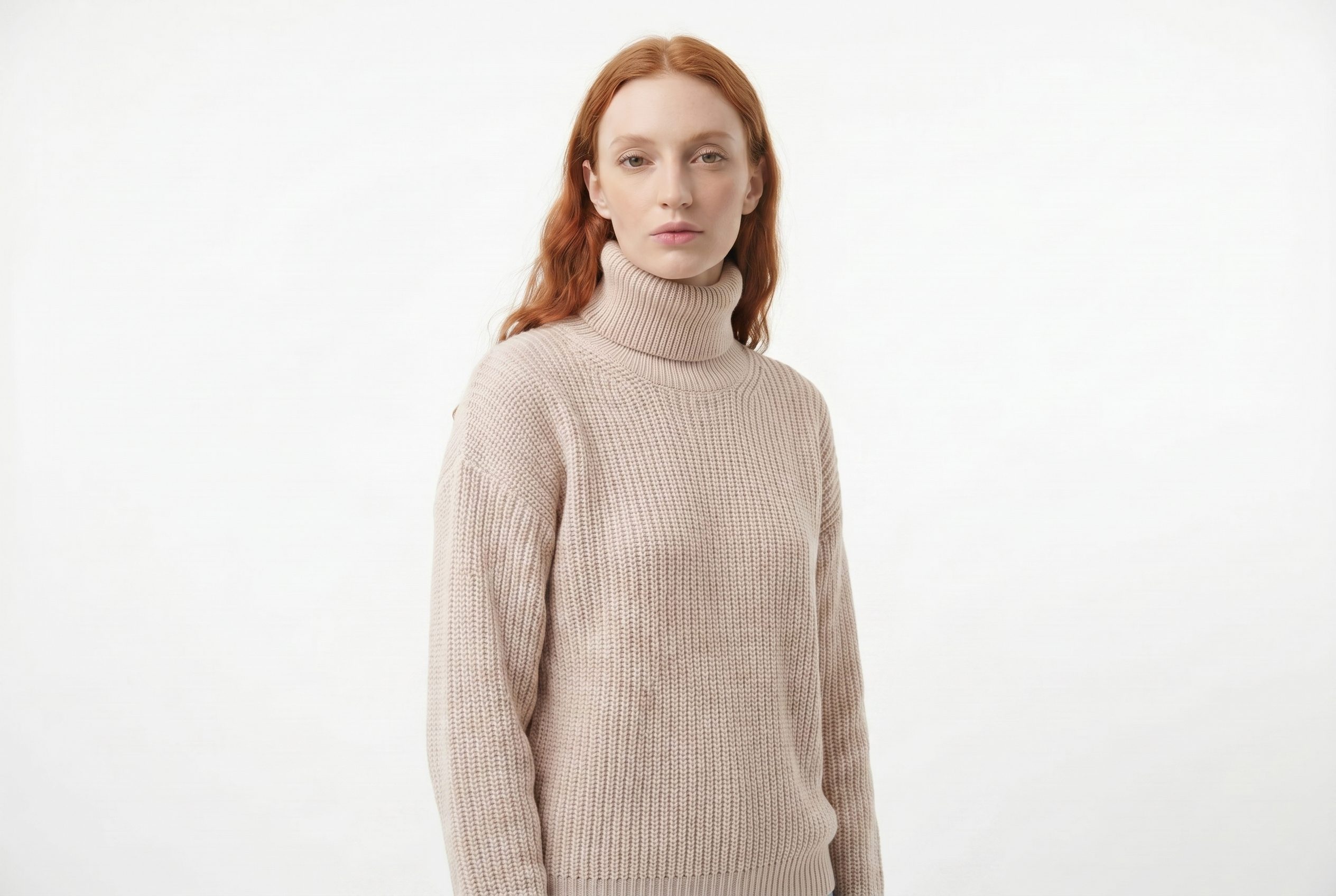 Fotogenic AI model generator output showing the same red-haired sweater model from a clean front ecommerce angle