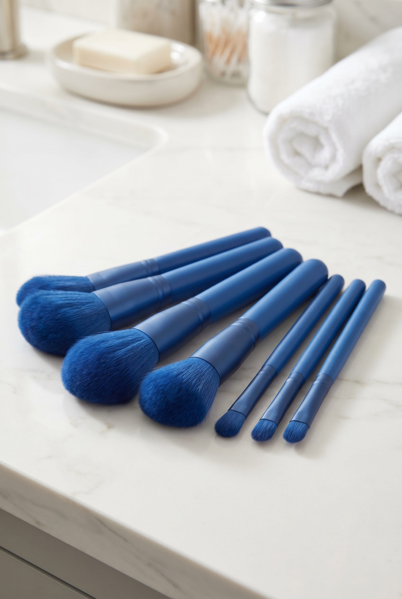 Fotogenic AI generated blue makeup brush set product photo on a vanity