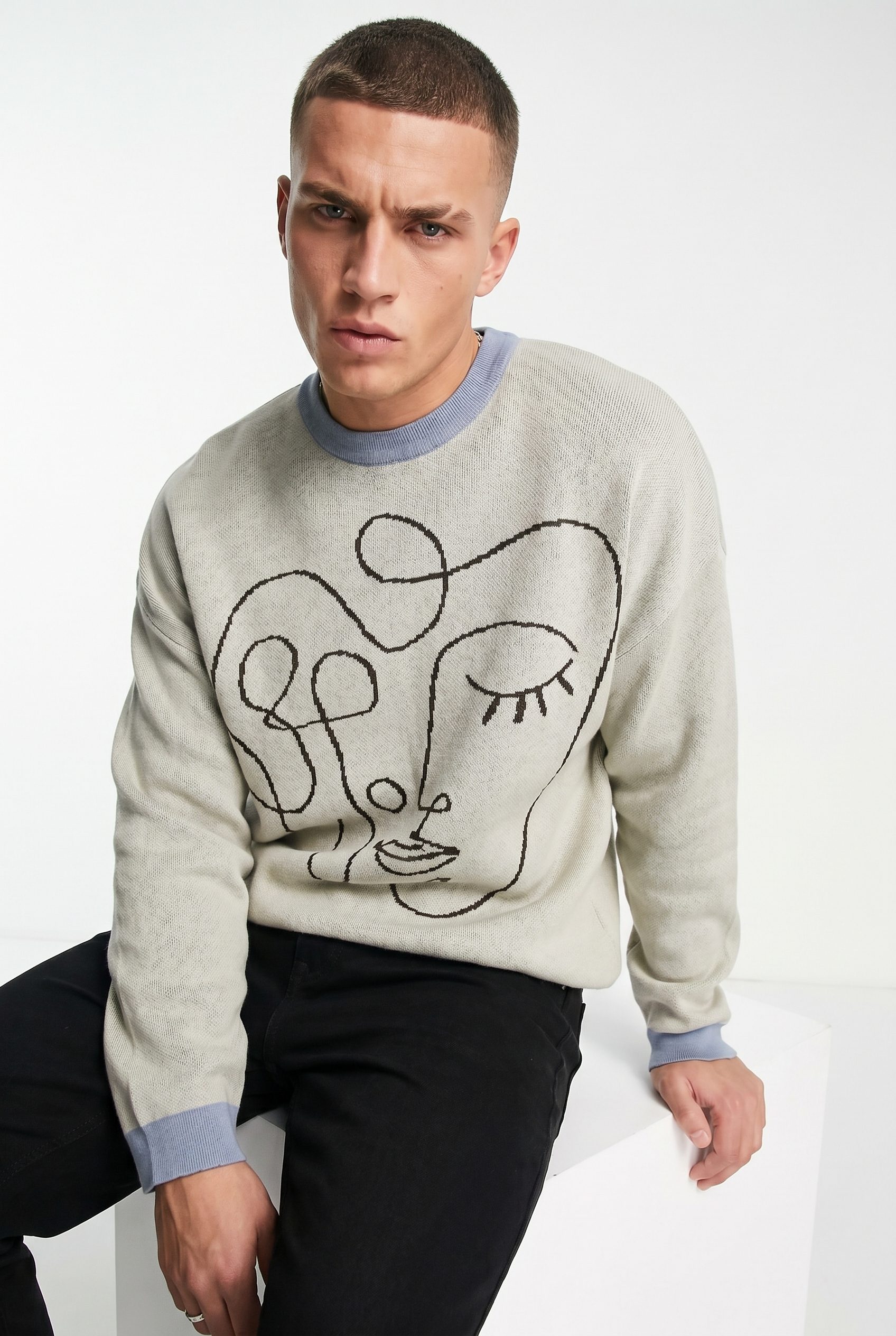 WordPress store visual showing beige knit sweater for apparel and fashion products