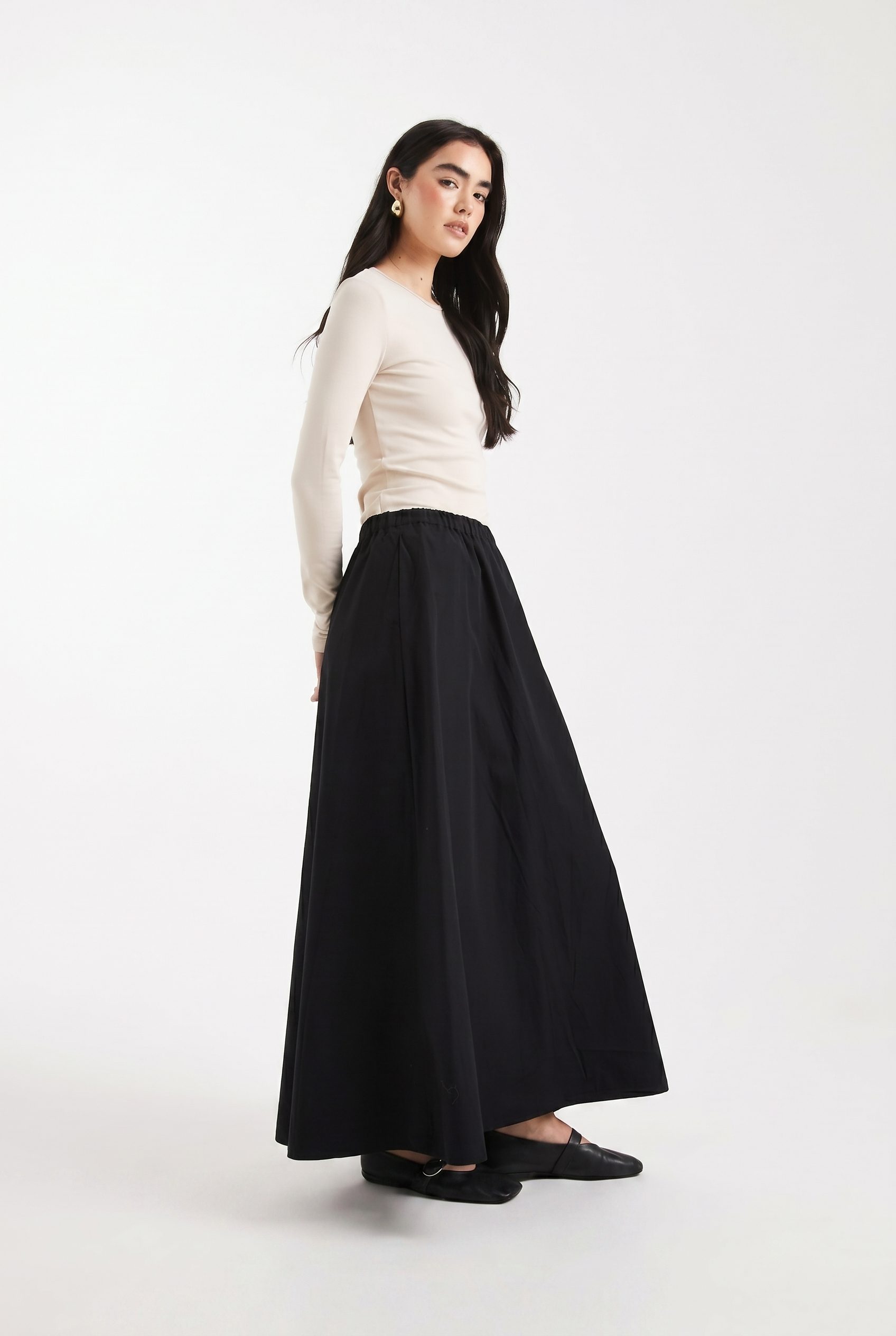 Shopify product visual showing black maxi skirt for apparel and fashion products