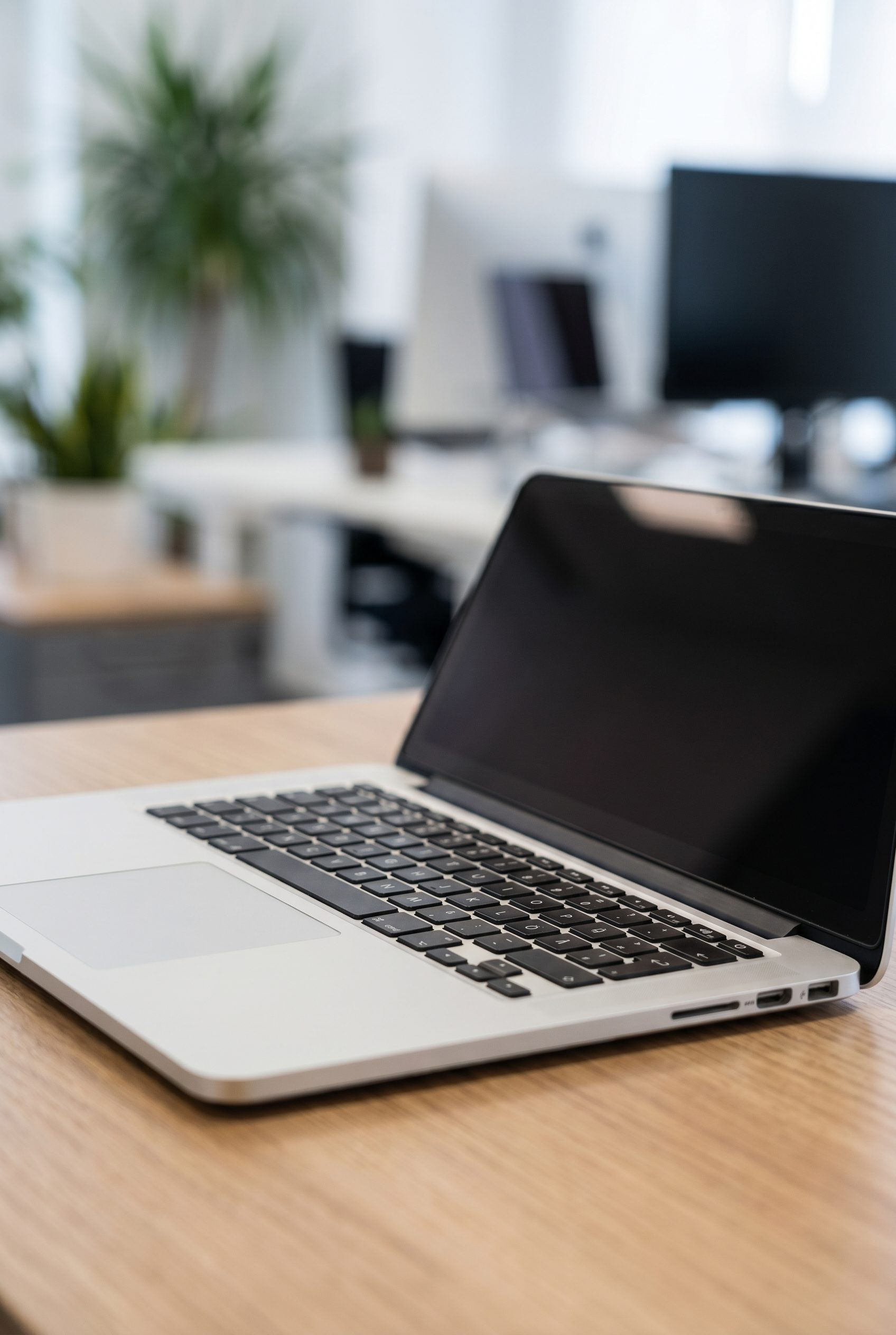 Google Shopping feed visual showing silver laptop for electronics products