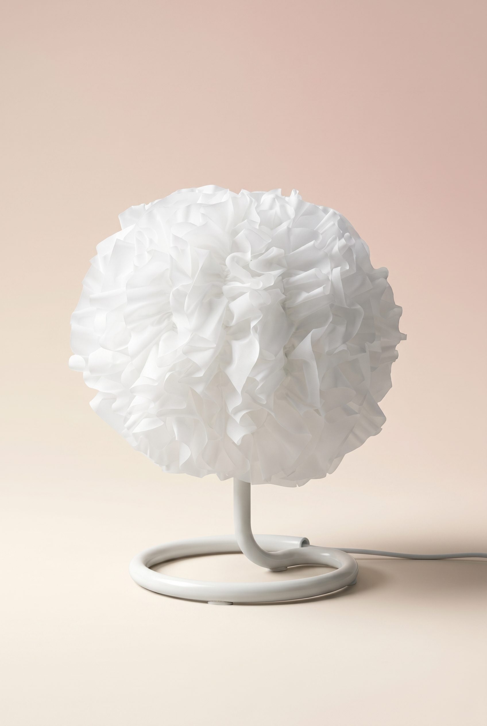 Amazon product photography example showing a white table lamp studio image