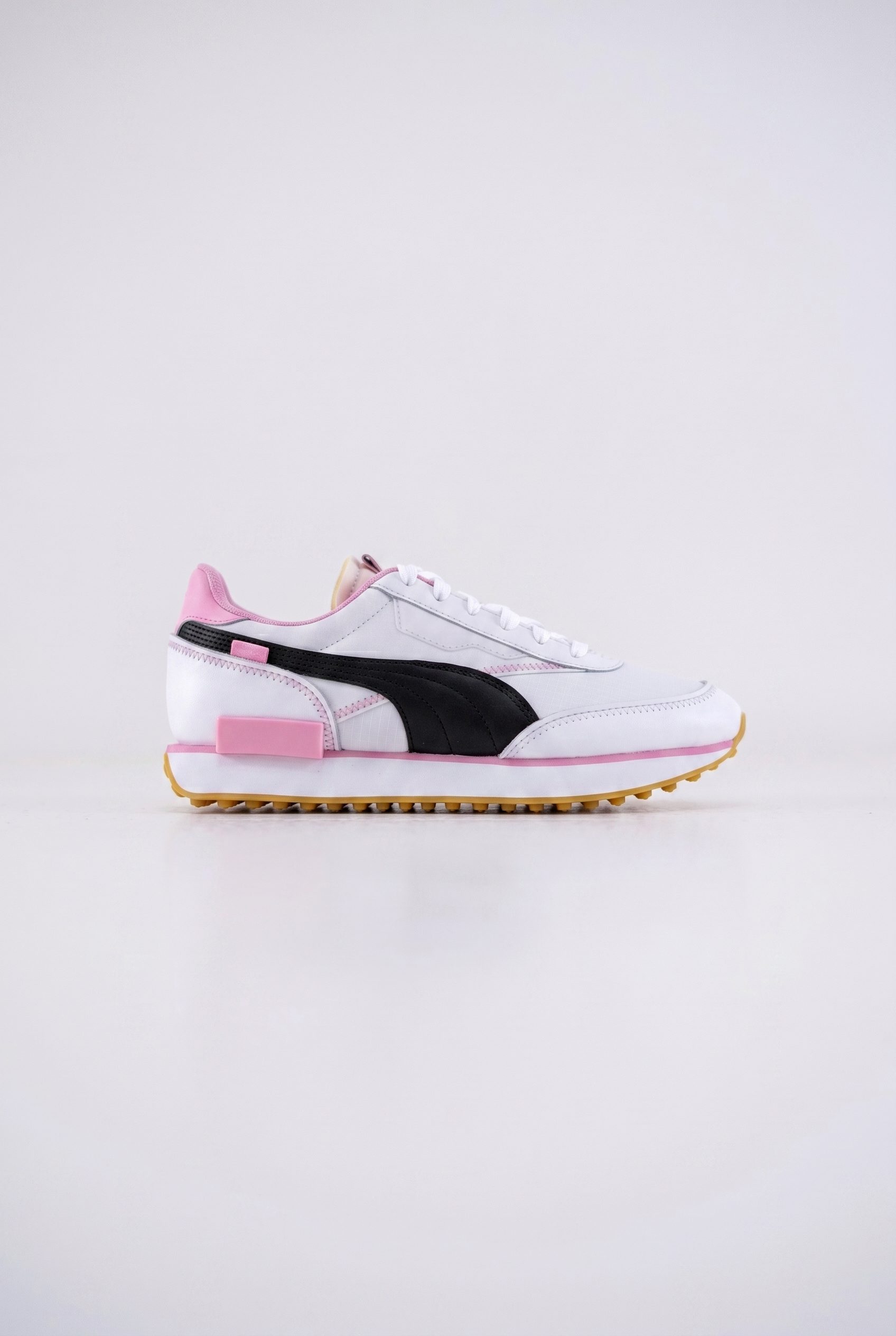 Fotogenic AI after unbranded sneaker studio product photo output for an AI product photo generator page