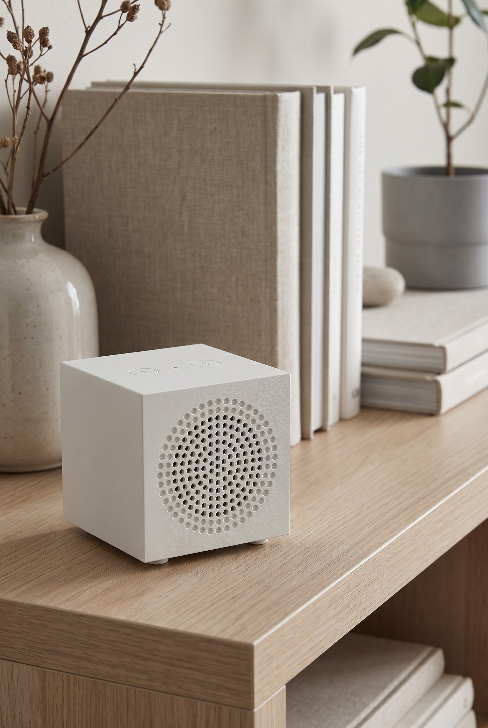 Amazon listing visual showing white bluetooth speaker shelf for electronics products