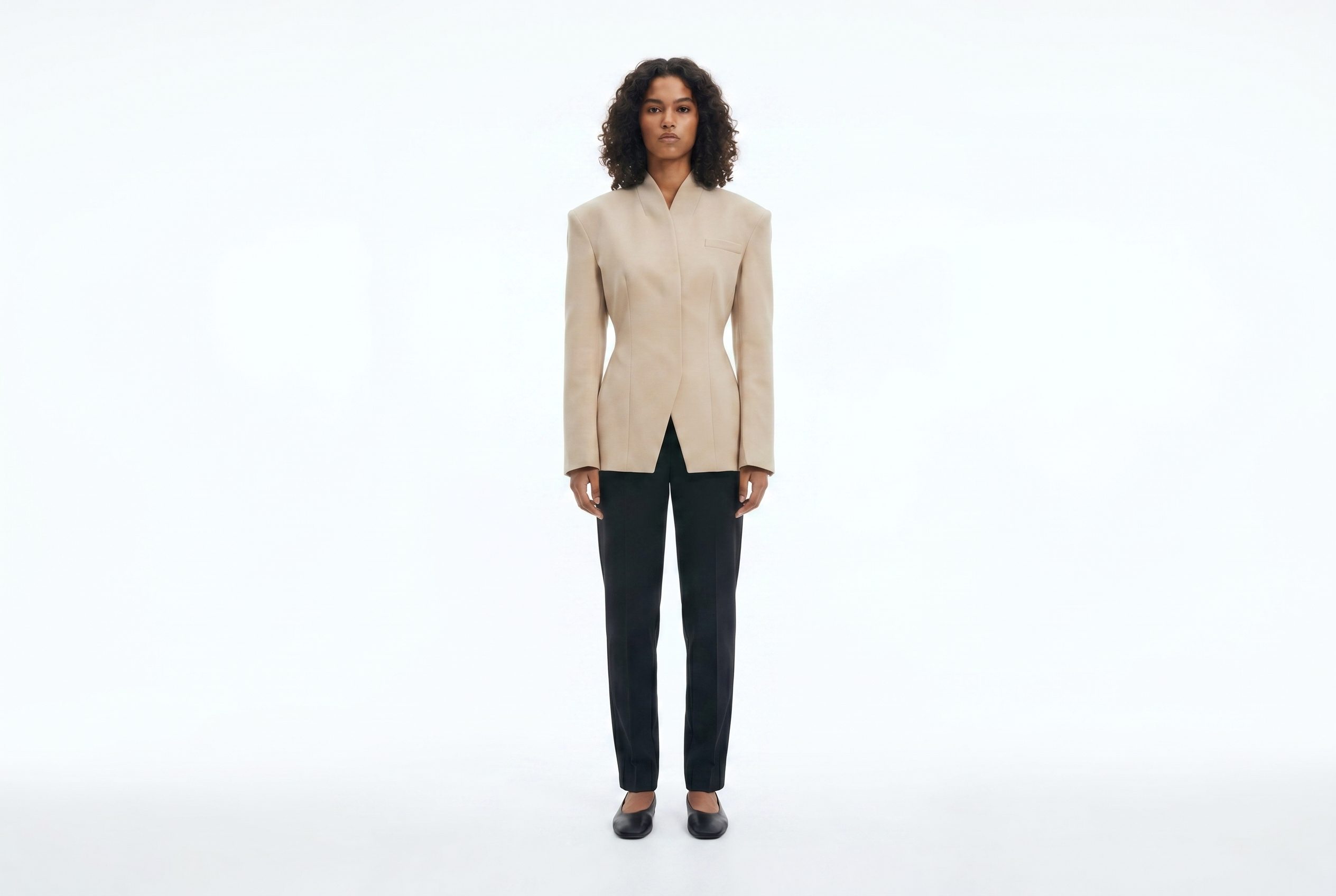 Shopify product photography example showing a beige wrap blazer ad creative