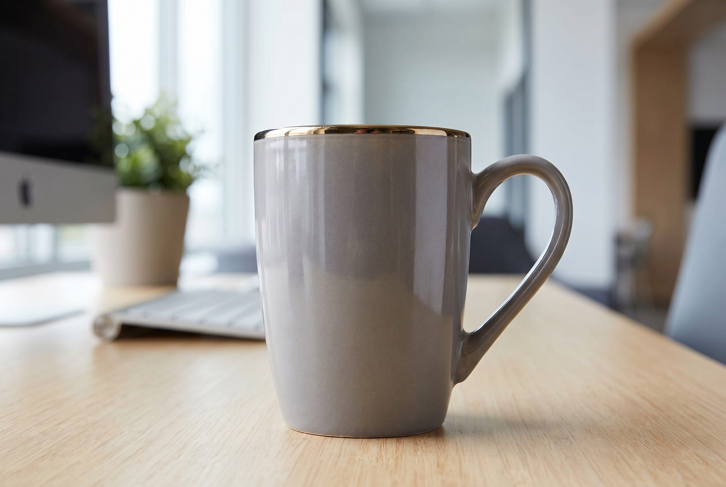 Fotogenic AI ecommerce workflow image of a gray ceramic mug product photo ready for upload