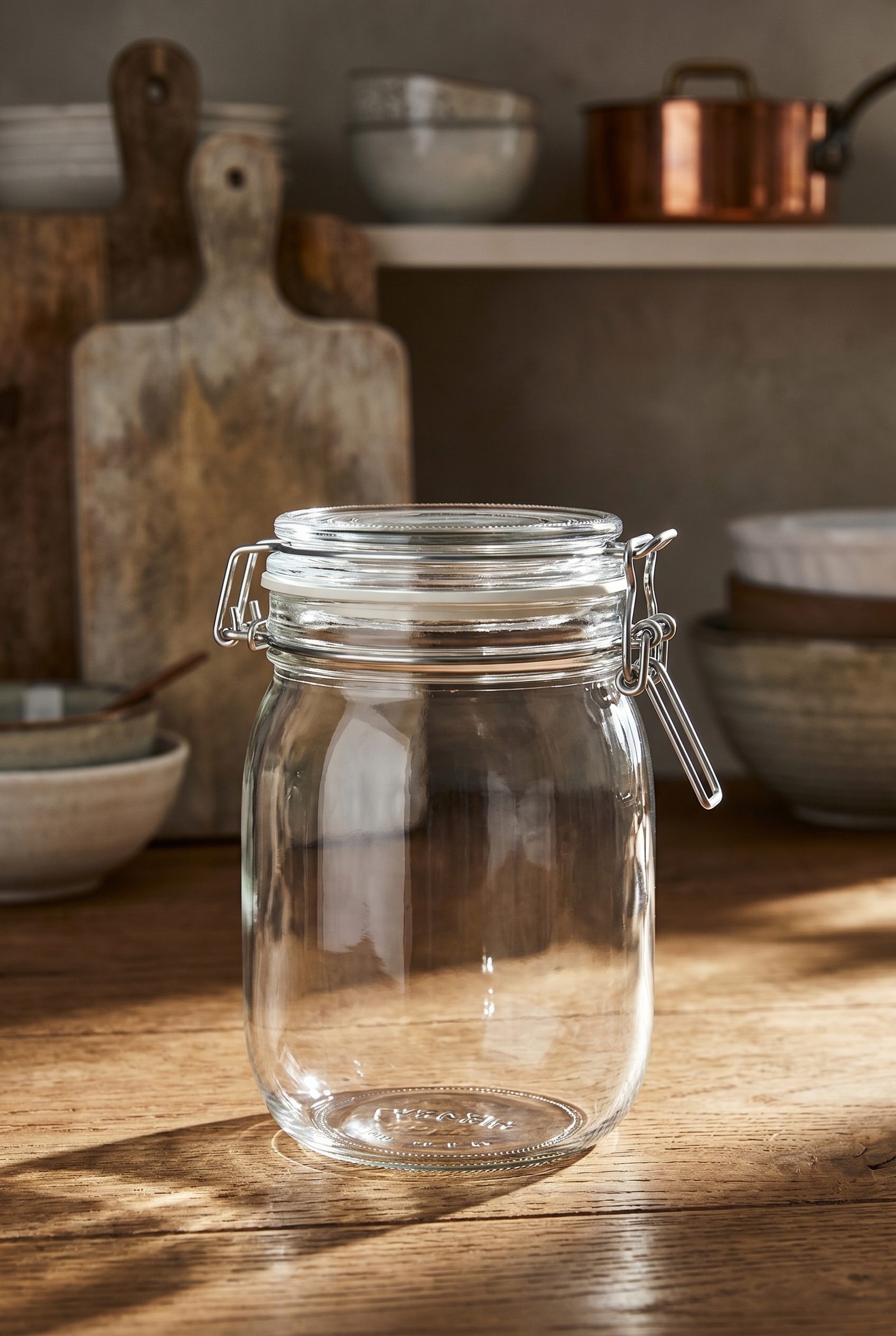 Bulk product image generation hard light studio scene with a glass storage jar