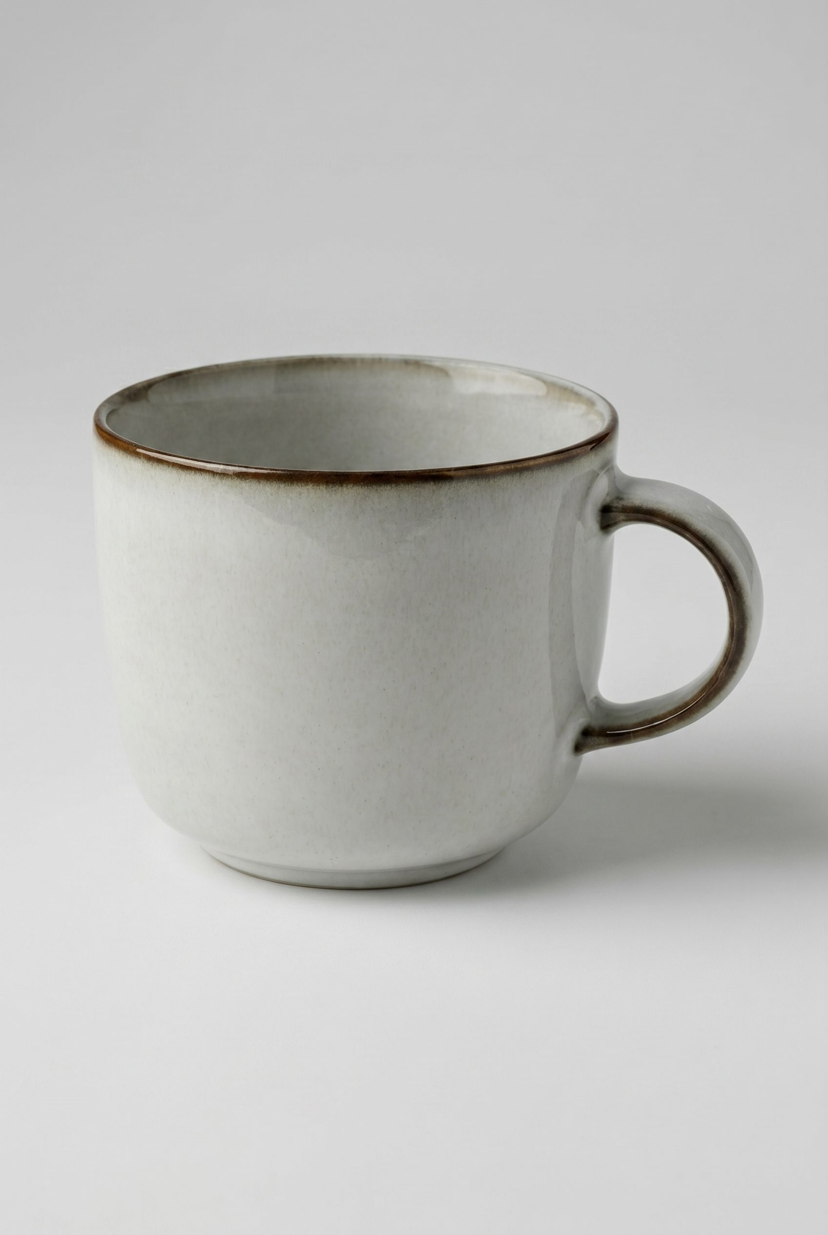 Etsy product photography style image of a handmade stoneware mug on a neutral background