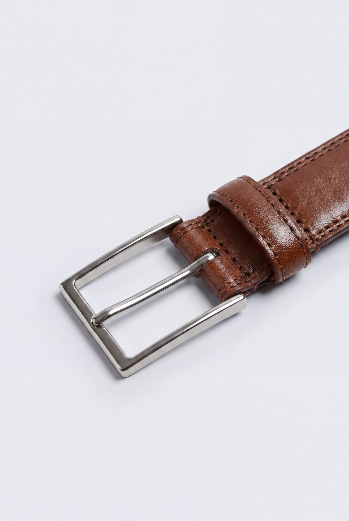 Fotogenic AI apparel example showing a clean leather belt detail for ecommerce product photography.