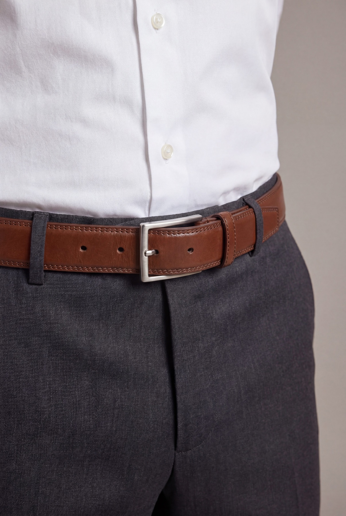 Fotogenic AI apparel example showing trouser, belt, fabric, and fit detail for ecommerce product photography.