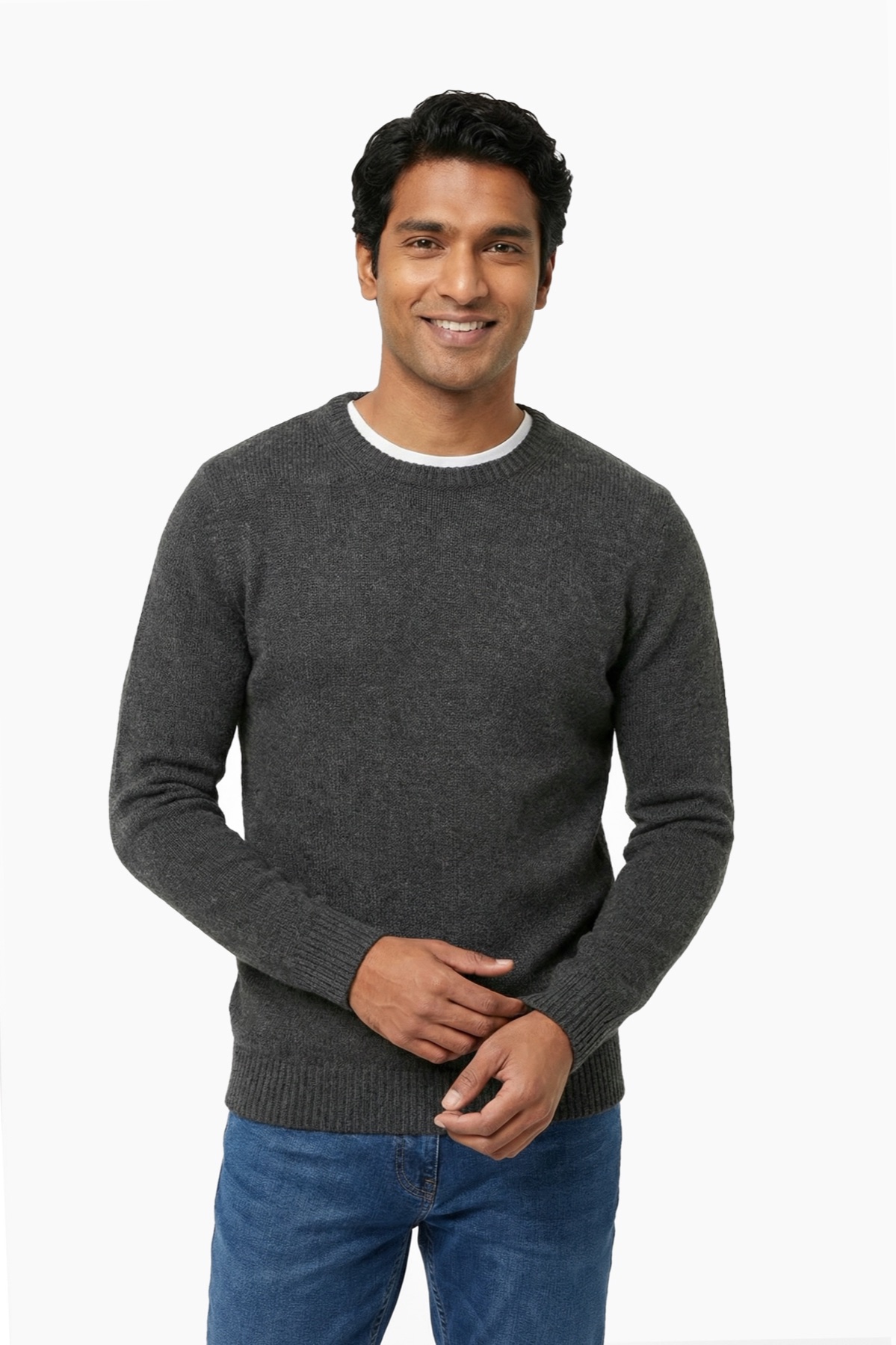 Fotogenic AI apparel product photography hero example showing an adult male model in a dark sweater for fit and garment-scale proof.