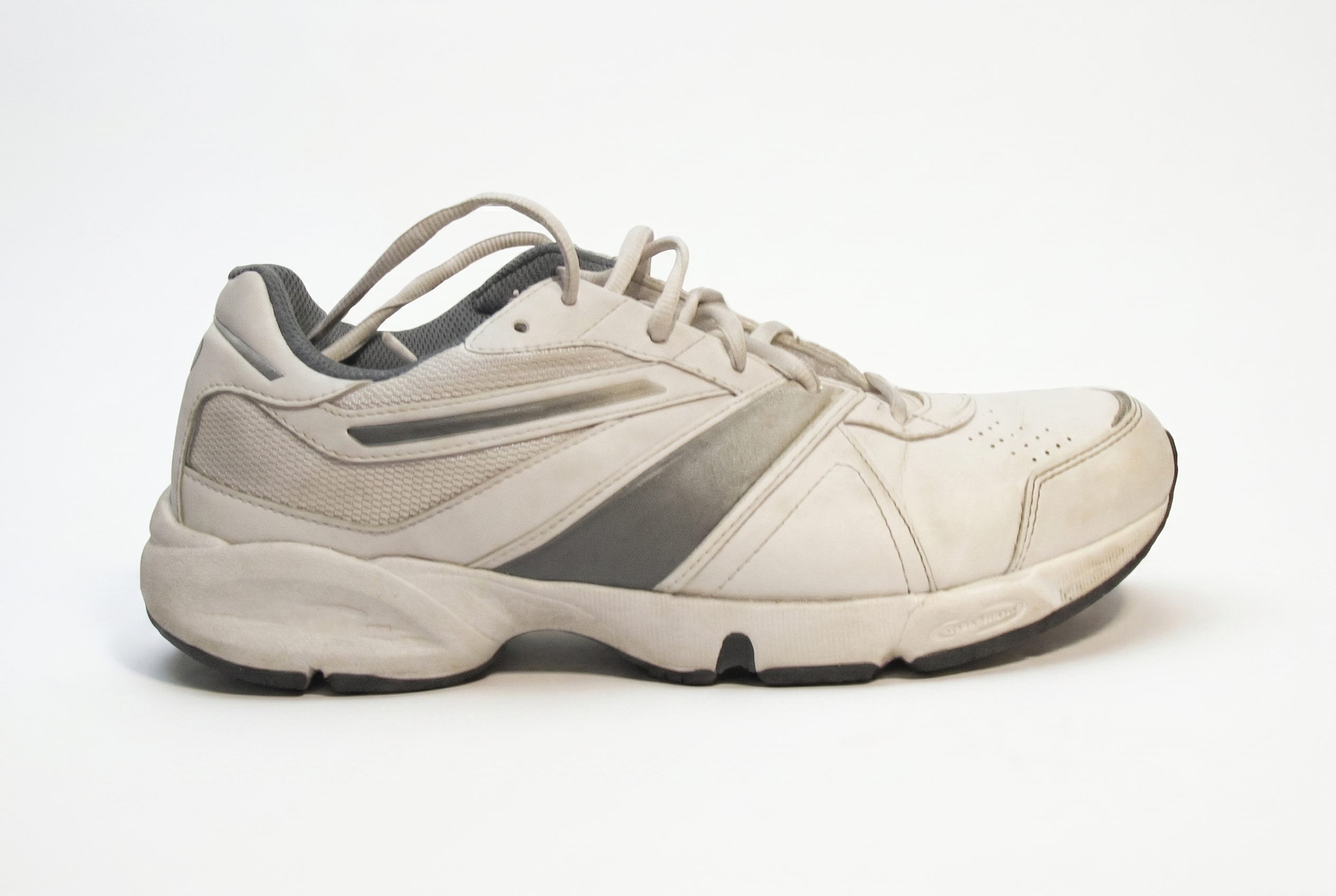 White background product photos output showing the same sneaker on a clean white catalog background
