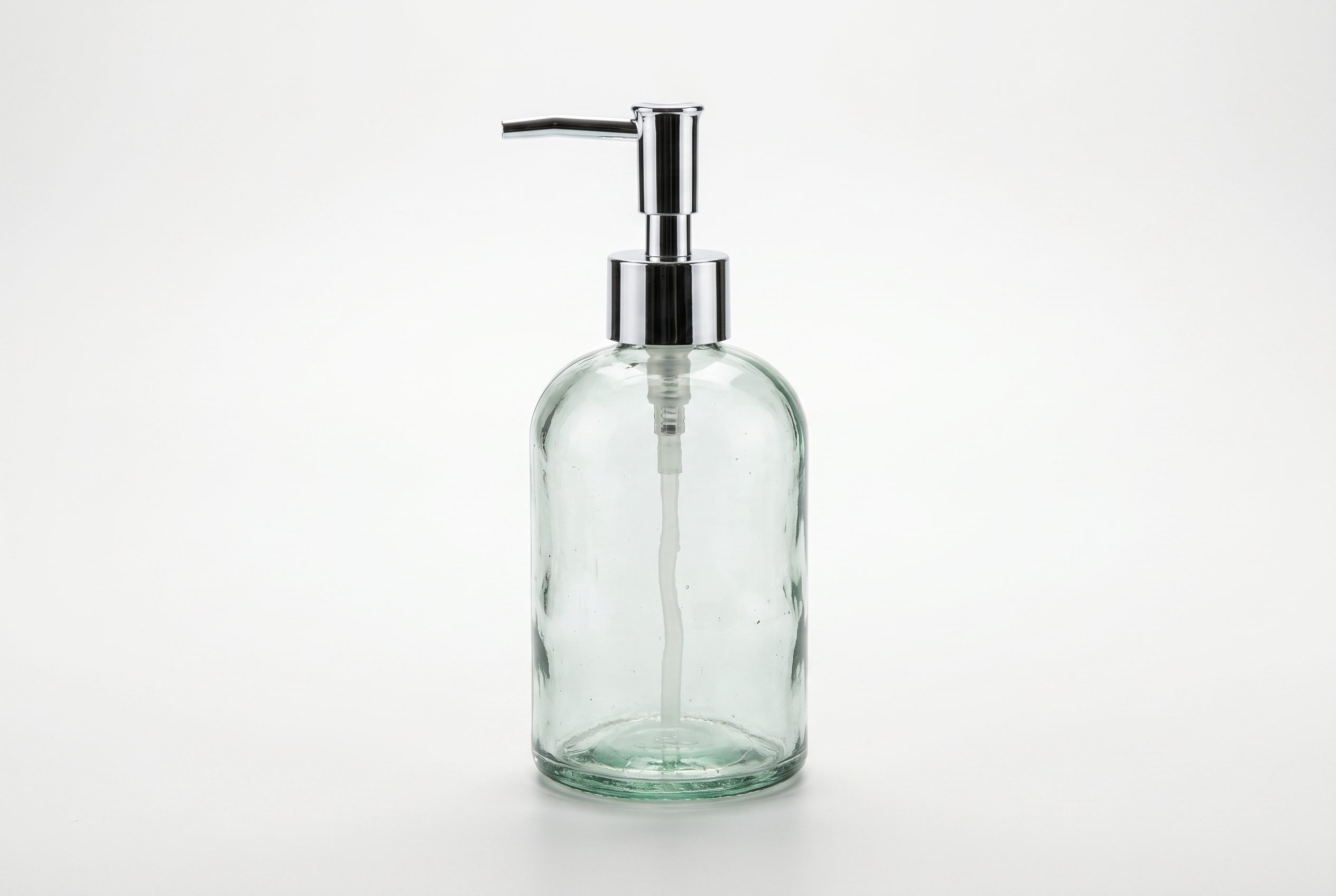 Bulk product image generation output showing the same glass soap dispenser in a consistent catalog batch style