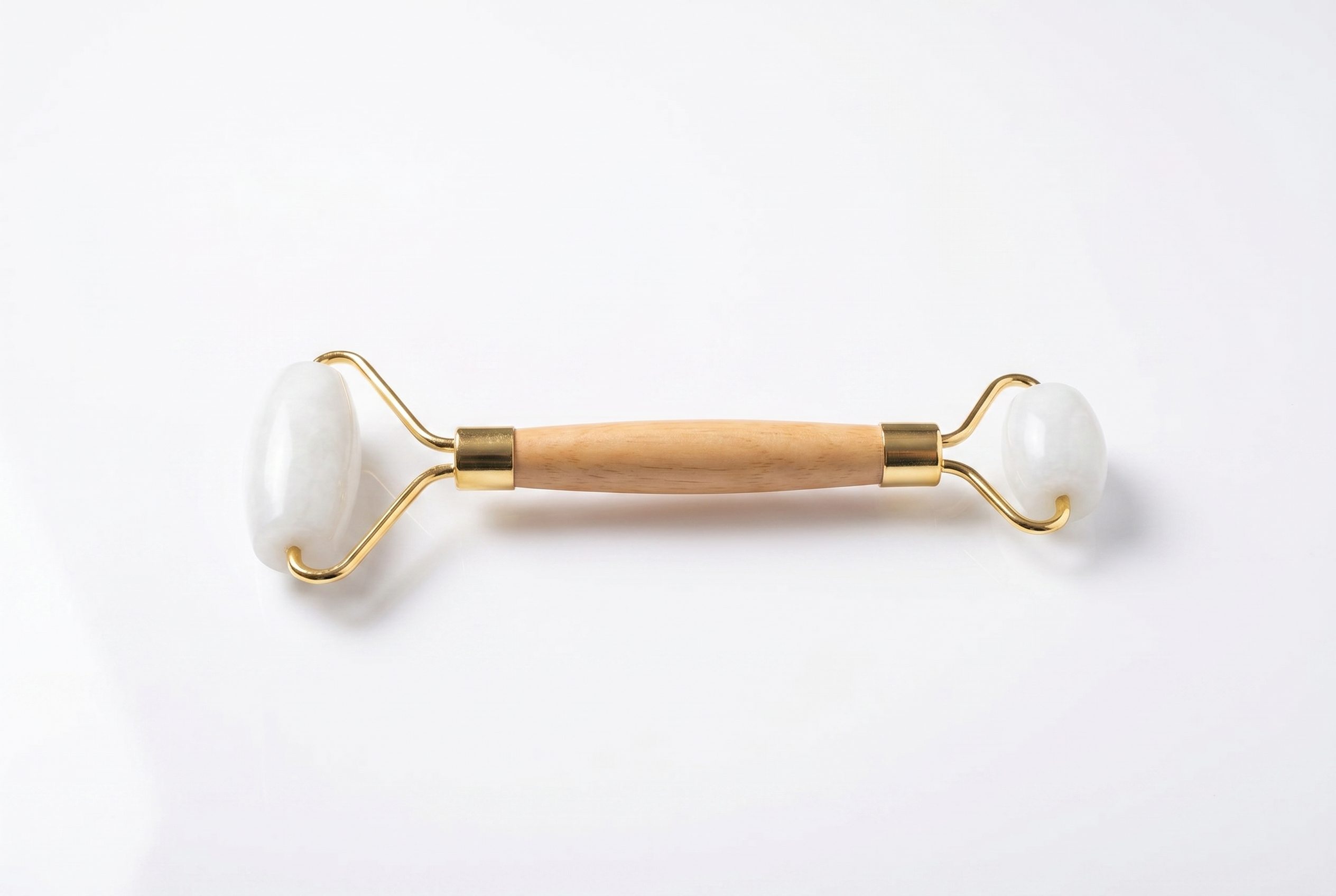 Bulk product image generation output showing the same jade face roller in a consistent catalog batch style