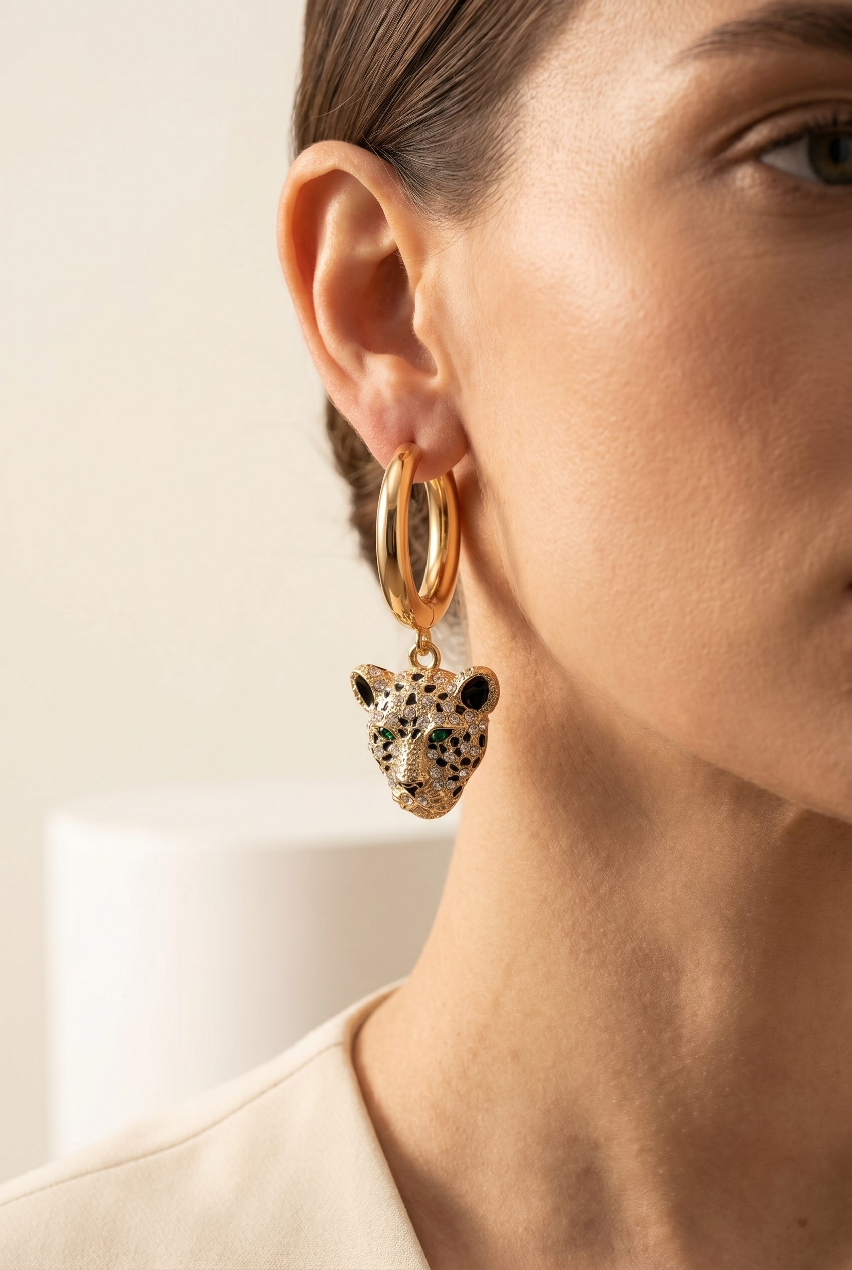 Fotogenic AI WordPress jewelry visual showing statement earrings worn on a model