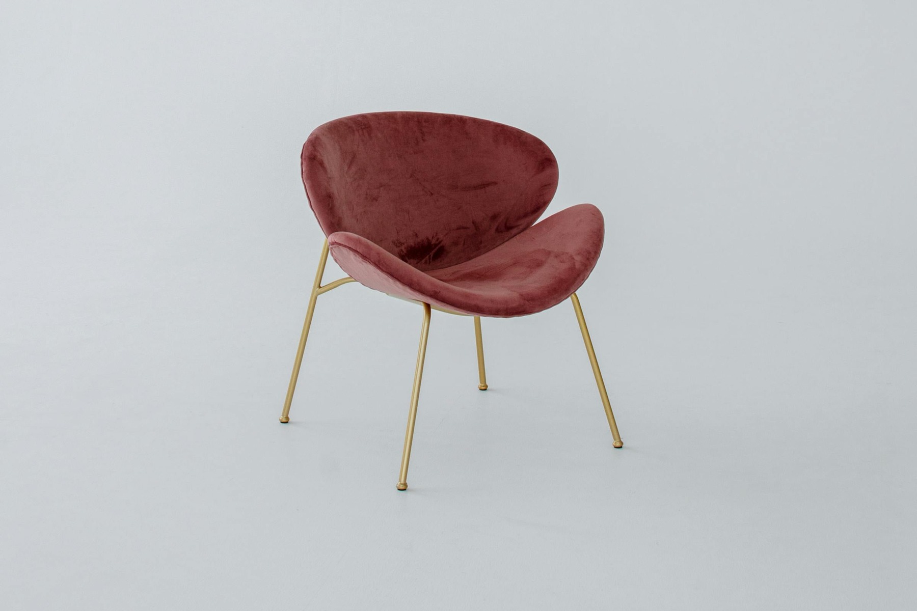 AI Product Photos for Ads before image showing red velvet chair on white background for chair ad creative