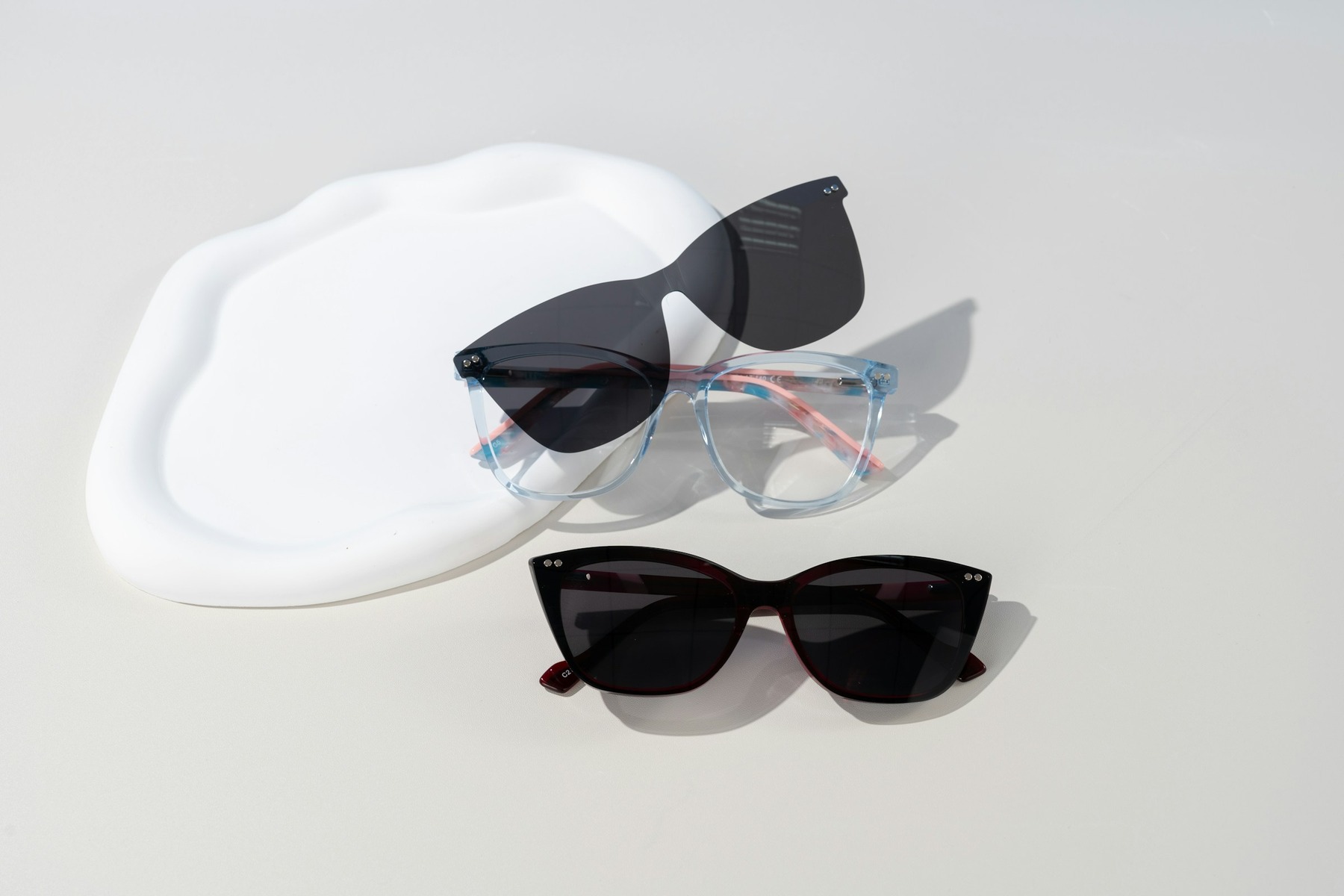 AI Model Generator for Product Photos before image showing sunglasses for eyewear on model
