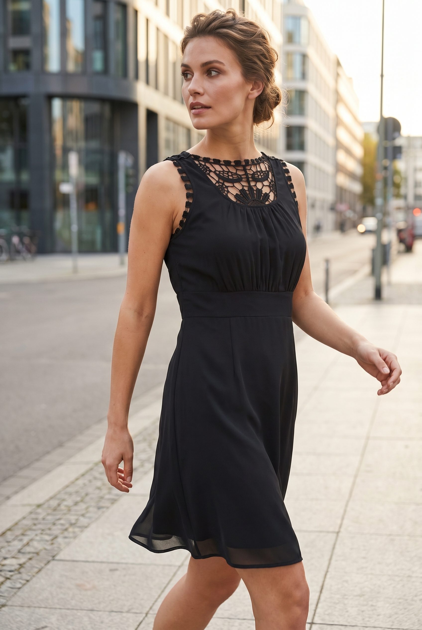 Black sleeveless dress lifestyle image for organic social campaign content.