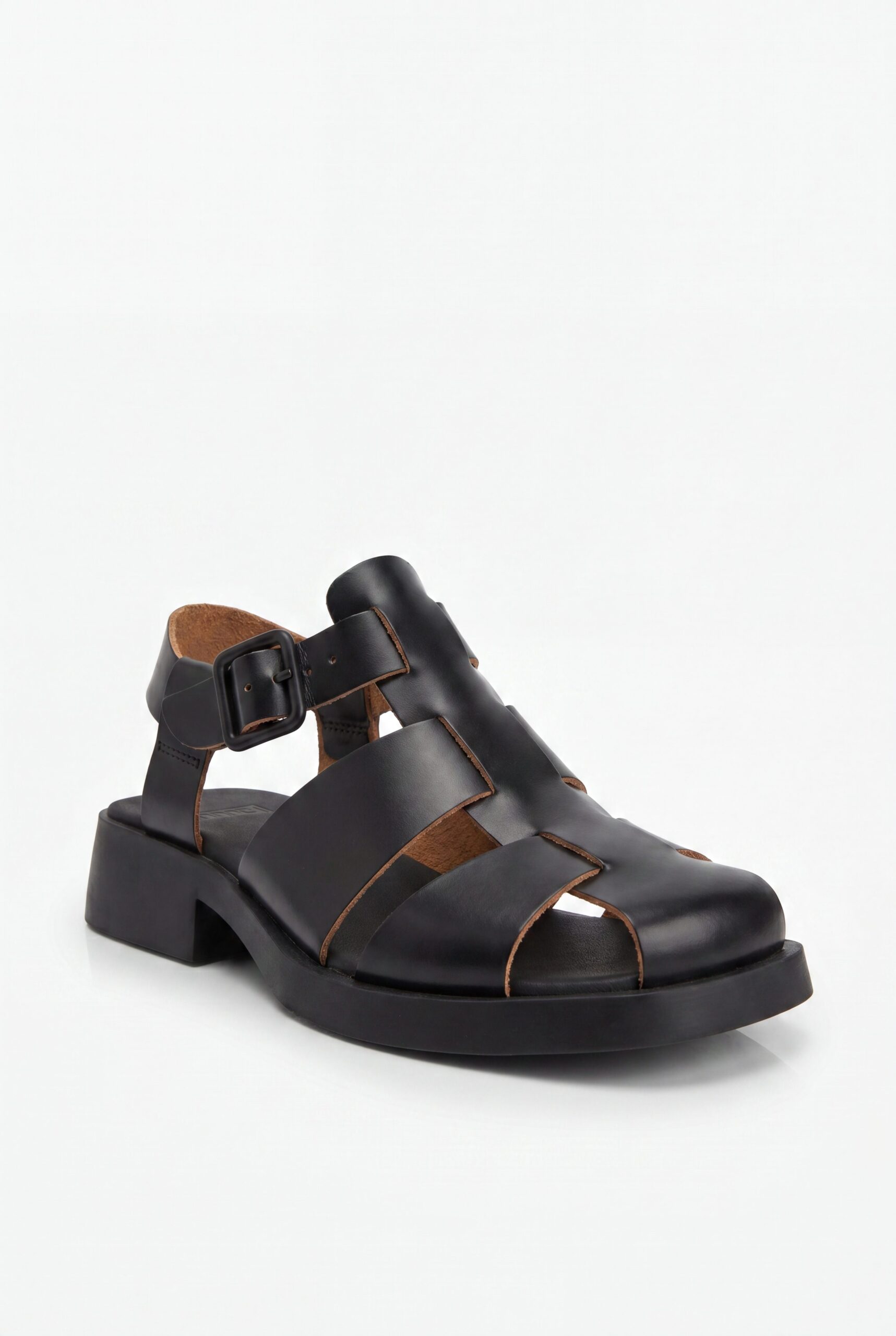 Black sandal product photo showing straps, sole shape, and clean ecommerce footwear detail.