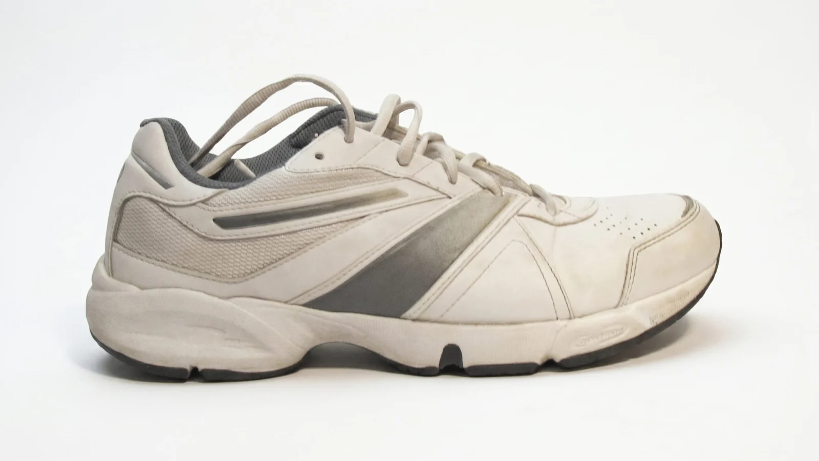 Light-colored sneaker on a clean white background