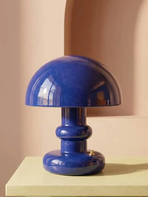 Cobalt ceramic table lamp on a lime side table video preview